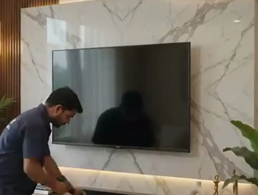 Fitting a soundbar under a marble TV feature wall, on site